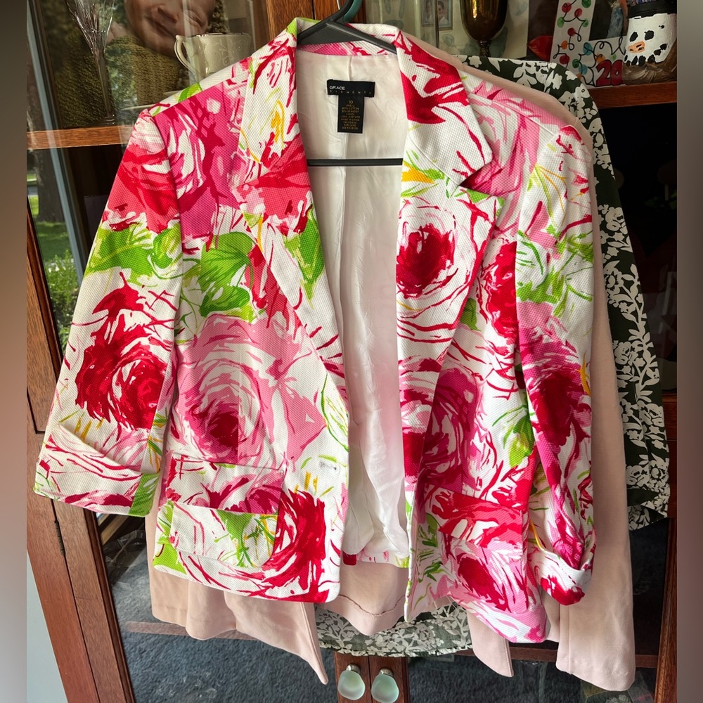 Gorgeous multi colored (bright) blazer with pockets. Barely worn. Size 10.